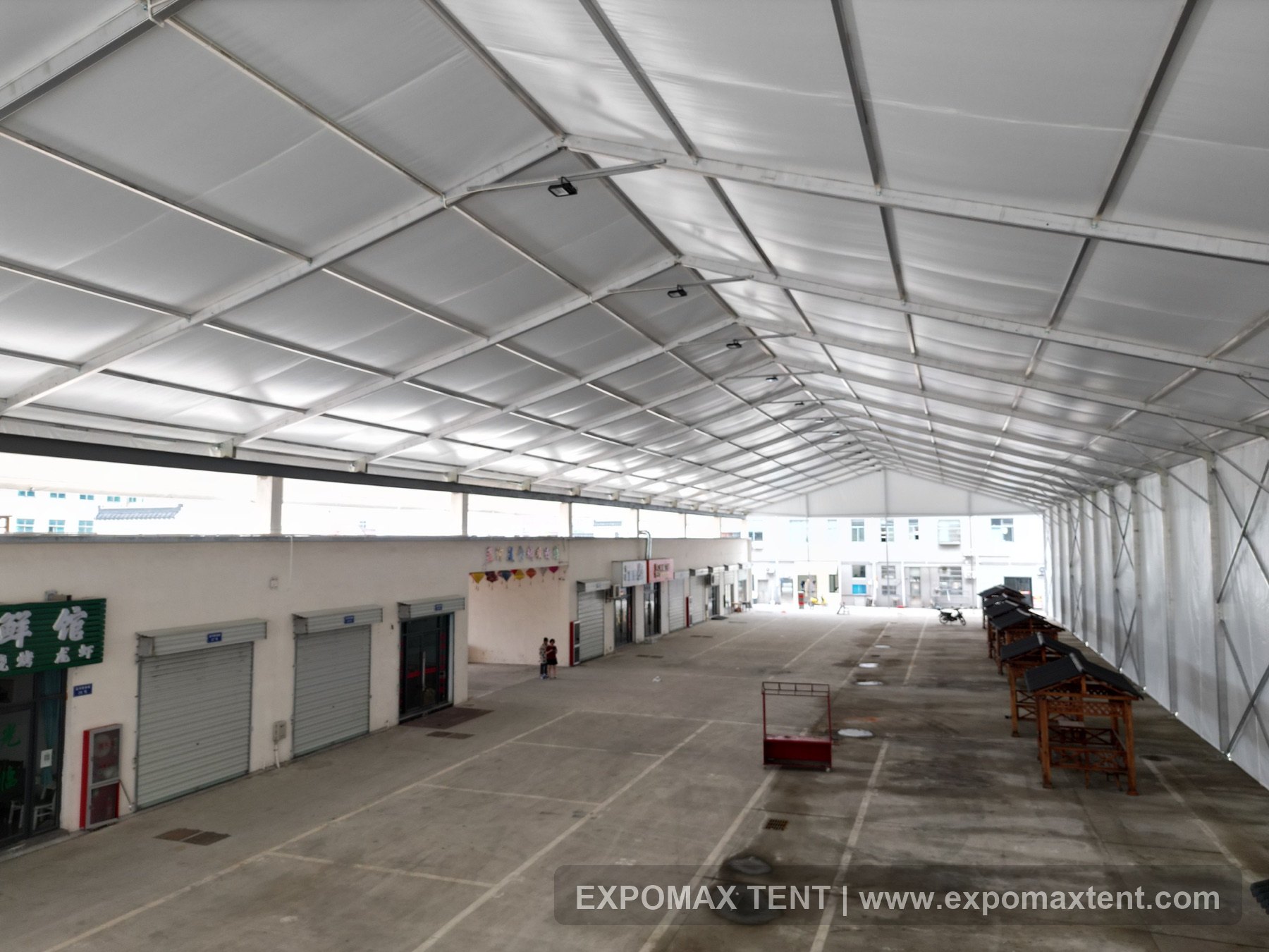 Large food court canopy covering a commercial street