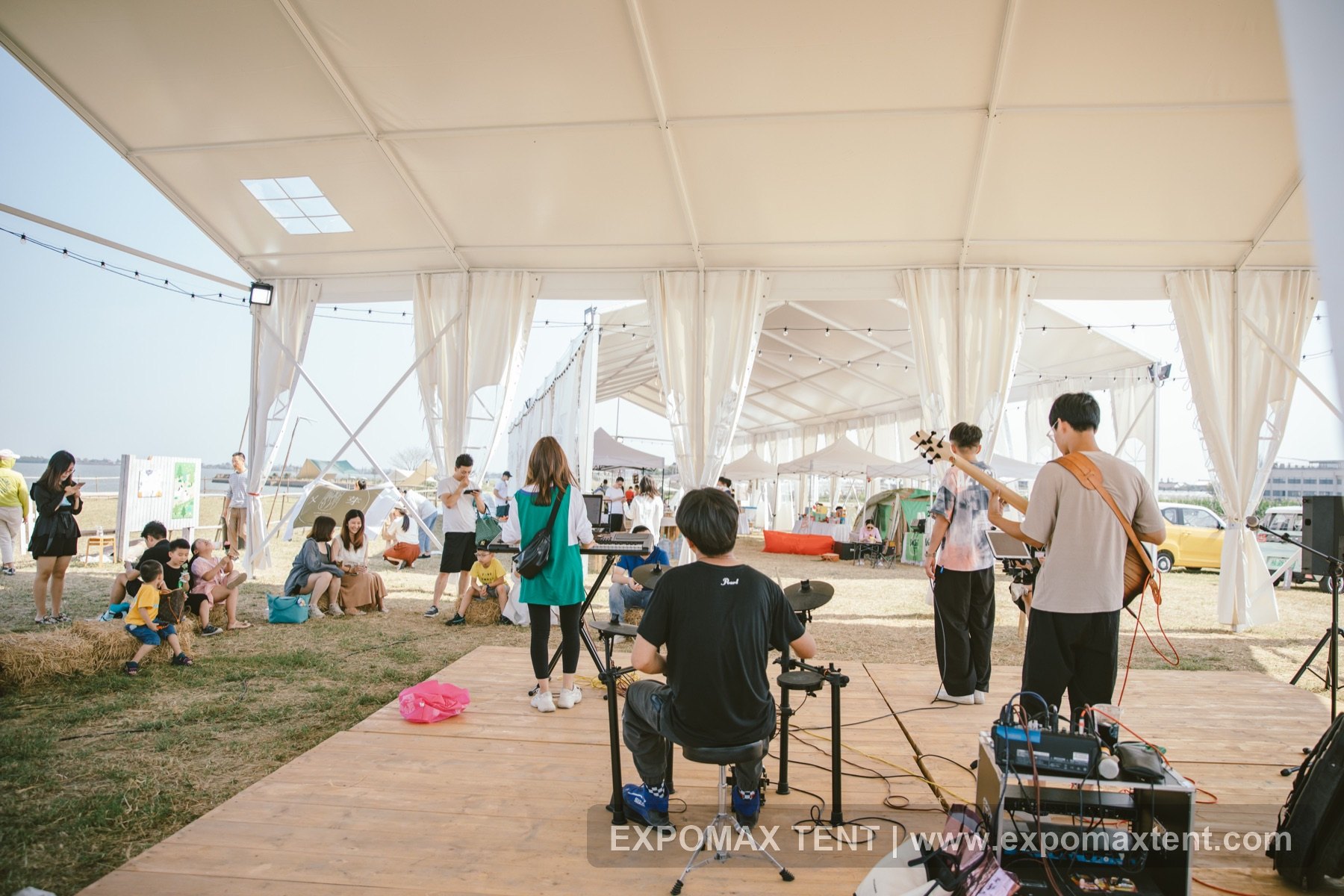 Open white party tent with clear window fabric