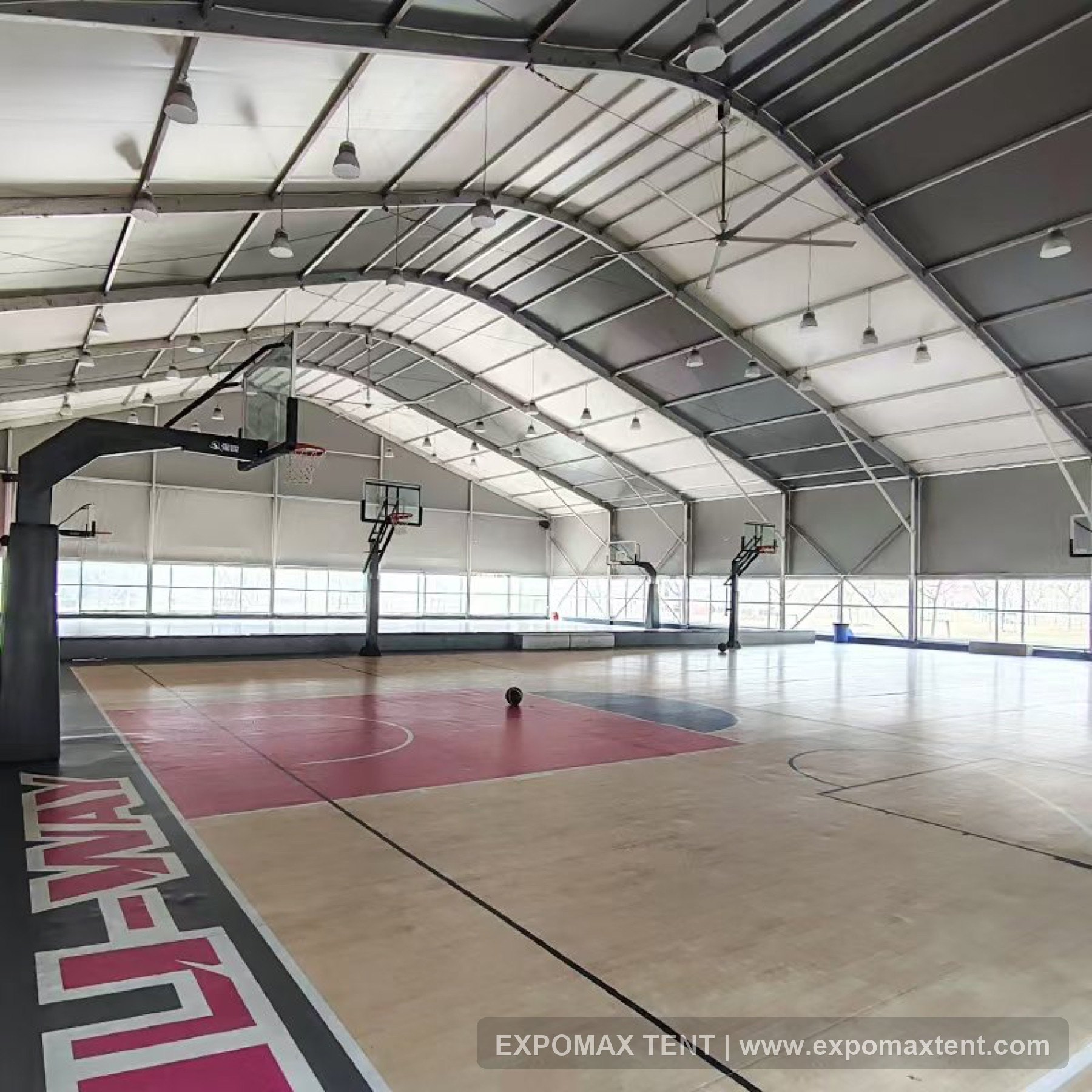 Indoor sports court built inside a tent structure
