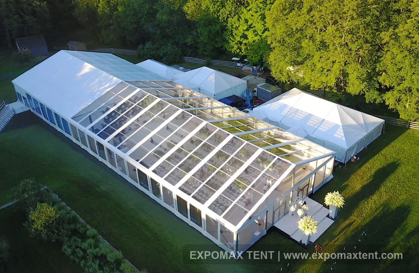 Clear roof wedding tent installed on a lawn venue